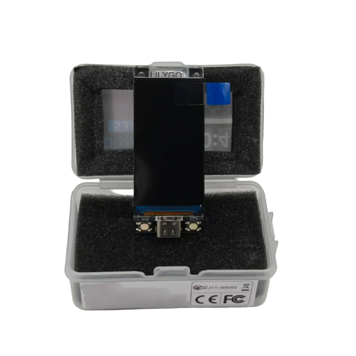 A replacement LCD display panel with a black screen, mounted on a circuit board inside an open clear plastic protective case with black foam padding, on a white background.