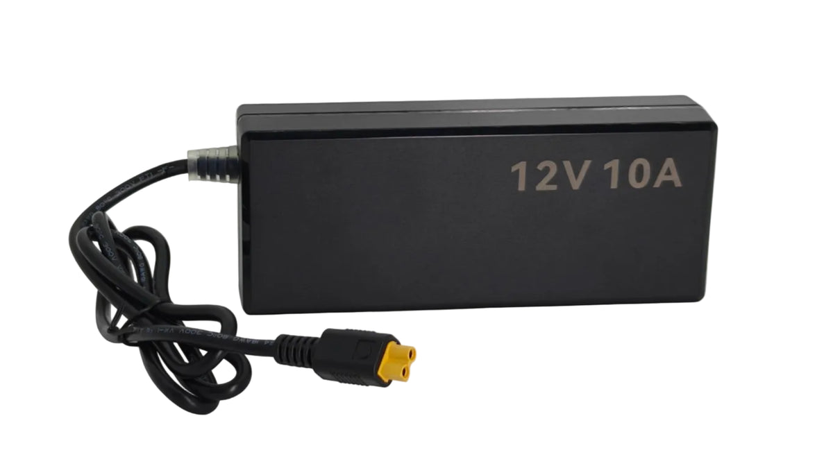A black rectangular 12V 10A power adapter with a coiled black cable and a yellow connector plug, shown on a light gray background.