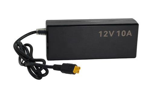 A black rectangular 12V 10A power adapter with a coiled black cable and a yellow connector plug, shown on a light gray background.